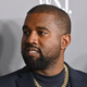 Kanye West posing on red carpet